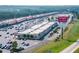 Aerial view of Tanger Outlets, showing multiple stores and parking at 7264 Eton Ln, Locust Grove, GA 30248