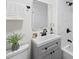 Modern bathroom with gray vanity, marble-look tile and updated fixtures at 150 Walker Sw St # 5, Atlanta, GA 30313