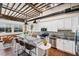Open concept kitchen with white cabinets and breakfast bar at 150 Walker Sw St # 5, Atlanta, GA 30313