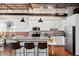 Modern kitchen with white cabinets, stainless steel appliances, and an island at 150 Walker Sw St # 5, Atlanta, GA 30313