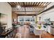 Modern white kitchen with stainless steel appliances and an island at 150 Walker Sw St # 5, Atlanta, GA 30313