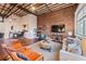 Spacious living room with exposed brick and hardwood floors at 150 Walker Sw St # 5, Atlanta, GA 30313