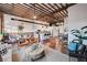 Open concept living space with exposed beams and hardwood floors at 150 Walker Sw St # 5, Atlanta, GA 30313
