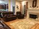 Relaxing living room with a fireplace and comfortable leather recliners at 1326 Nantahala Ne Trl, Marietta, GA 30062