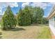 Spacious backyard with mature trees and lawn at 5170 Stone Croft Trl, Atlanta, GA 30331