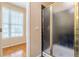 Small bathroom with a shower and window at 5170 Stone Croft Trl, Atlanta, GA 30331
