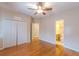 Bright bedroom with hardwood floors and an ensuite bathroom at 5170 Stone Croft Trl, Atlanta, GA 30331
