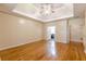 Hardwood floor bedroom with high ceilings and ceiling fan at 5170 Stone Croft Trl, Atlanta, GA 30331