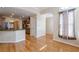 Bright dining area with hardwood floors and access to the kitchen at 5170 Stone Croft Trl, Atlanta, GA 30331