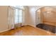 Hardwood floor dining room with large window and neutral wall colors at 5170 Stone Croft Trl, Atlanta, GA 30331