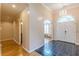 Spacious entryway with tile and hardwood floors, leading to other rooms at 5170 Stone Croft Trl, Atlanta, GA 30331