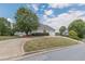 House exterior showcasing a large driveway and green lawn at 5170 Stone Croft Trl, Atlanta, GA 30331