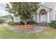 Welcoming front entrance with stone steps, landscaping, and a tree at 5170 Stone Croft Trl, Atlanta, GA 30331