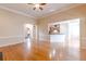 Spacious living room with hardwood floors, fireplace, and built-in shelving at 5170 Stone Croft Trl, Atlanta, GA 30331