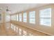Sunroom featuring a ceiling fan and tile floors at 5170 Stone Croft Trl, Atlanta, GA 30331