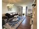 Bright living room with hardwood floors and comfortable seating at 130 26Th Nw St # 808, Atlanta, GA 30309