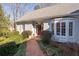 Brick walkway leading to charming home with bay window at 28 Ridgemere Trce, Atlanta, GA 30328