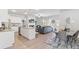 Bright dining area with hardwood floors and stylish furniture at 703 Cygnet Ln, Grayson, GA 30017