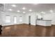 Spacious finished basement with hardwood floors and a kitchenette at 2733 Caldwell Rd, Brookhaven, GA 30319