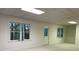 Unfinished basement with ample space and natural light at 1800 Riverglen Dr, Suwanee, GA 30024