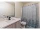 Clean bathroom with a shower/tub combo and updated vanity at 3112 Spicy Cedar Ln, Lithonia, GA 30038