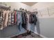 Spacious walk-in closet with ample shelving and hanging space at 3112 Spicy Cedar Ln, Lithonia, GA 30038