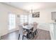 Dining area with gray flooring and access to the backyard at 3112 Spicy Cedar Ln, Lithonia, GA 30038