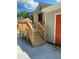 Elevated wooden deck with stairs leading to backyard, offering extra outdoor space at 723 Casplan Sw St, Atlanta, GA 30310