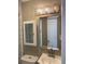 Updated bathroom with vanity, mirror, and medicine cabinet at 723 Casplan Sw St, Atlanta, GA 30310