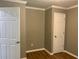 Bedroom with two closets and wood-look floors at 723 Casplan Sw St, Atlanta, GA 30310