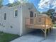 Gray brick house with a new wooden deck at 723 Casplan Sw St, Atlanta, GA 30310