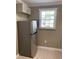 Stainless steel refrigerator in a modern kitchen at 723 Casplan Sw St, Atlanta, GA 30310