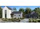 Stunning modern farmhouse with attached two-car garage and solar panels at 150 Cedarwood Ln, Roswell, GA 30075