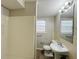 Clean bathroom with a shower, vanity, and toilet at 422 Windsor Dr, Forest Park, GA 30297