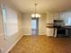 Dining area with tile floor and access to kitchen at 422 Windsor Dr, Forest Park, GA 30297