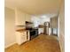 Kitchen with white cabinets, stainless steel appliances, and tile floor at 422 Windsor Dr, Forest Park, GA 30297