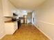 Kitchen with white cabinets, stainless steel appliances, and tile floor at 422 Windsor Dr, Forest Park, GA 30297
