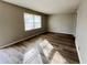 Bright living room with hardwood floors and neutral walls at 422 Windsor Dr, Forest Park, GA 30297