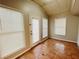 Bright sunroom with tile flooring, multiple windows, and exterior access at 422 Windsor Dr, Forest Park, GA 30297