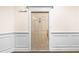 Interior hallway with beige walls and carpeting, showing unit door at 234 Ashford Cir, Atlanta, GA 30338