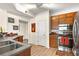 Modern kitchen with stainless steel appliances and wood cabinets at 234 Ashford Cir, Atlanta, GA 30338