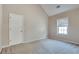 Well-lit bedroom with neutral walls and carpet at 3402 Newtons Crest Cir, Snellville, GA 30078