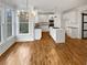Modern kitchen with white cabinets and a large island at 3714 Thunder Ne Way, Marietta, GA 30066