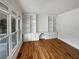 Bright living room with hardwood floors and built-in shelving at 3714 Thunder Ne Way, Marietta, GA 30066