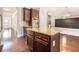 Kitchen island with granite countertops and hardwood floors at 4039 Dinmont Chase Dr, South Fulton, GA 30349