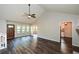 Spacious living room with vaulted ceilings, dark hardwood floors and a fireplace at 3054 Chelsea Ln, Acworth, GA 30102