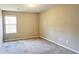 Bright bedroom with large window and carpet at 1561 Eastern Sunrise Ln, Decatur, GA 30034