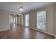 Bright living room with hardwood floors, vaulted ceiling and fireplace at 427 Picketts Lake Dr, Acworth, GA 30101