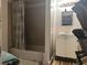 Bathroom with tub, shower, and vanity with a mirror at 271 Andrew Hairston Nw, Atlanta, GA 30314