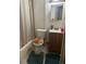 Small bathroom with shower, toilet, and vanity at 271 Andrew Hairston Nw, Atlanta, GA 30314